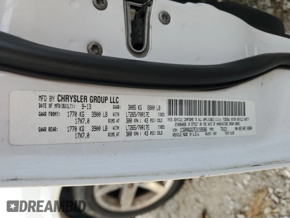 2014 Ram 1500 Big Horn z VIN 1C6RR6GG7ES159586, wystawiony jako Copart lot #74671024 z przebiegiem 220 060 mil mil oraz Szkoda całkowita • Salvage title. Historia ofert i sprzedaży dostępna na DreamBid. Obrazek 13.