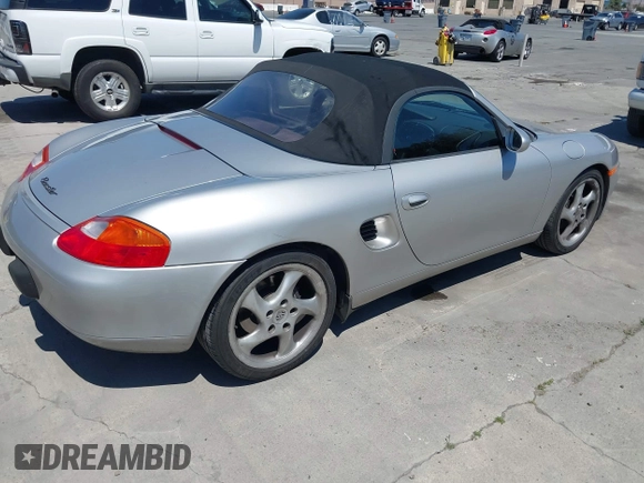 1999 Porsche Boxster with VIN WP0CA2984XU624983, listed as a IAAI auction lot 42722102 with 100,889 mi miles and . Bid and sale history available at DreamBid. Image 4.