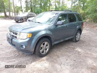 2012 Ford Escape XLT z VIN 1FMCU9DG9CKC73956, wystawiony jako IAAI lot #42812731 z przebiegiem 138 403 mil mil oraz . Historia ofert i sprzedaży dostępna na DreamBid. Obrazek 2.