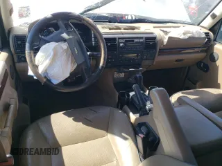 2000 Land Rover Discovery Cloth z VIN SALTY1242YA252357, wystawiony jako Copart lot #76602914 z przebiegiem 107 927 mil mil oraz Szkoda całkowita • Salvage title. Historia ofert i sprzedaży dostępna na DreamBid. Obrazek 8.