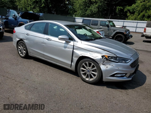 2017 Ford Fusion SE with VIN 3FA6P0HD4HR187841, listed as a Copart auction lot 61766415 with 74,303 mi miles and Salvage title. Bid and sale history available at DreamBid. Image 4.