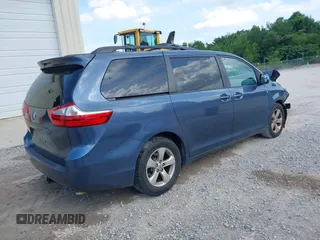 2015 Toyota Sienna LE AAS with VIN 5TDKK3DCXFS624984, listed as a IAAI auction lot 42560632 with 169,034 mi miles and . Bid and sale history available at DreamBid. Image 4.