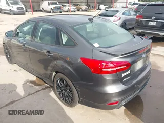 2016 Ford Focus SE z VIN 1FADP3F28GL360512, wystawiony jako IAAI lot #42427723 z przebiegiem 217 172 mil mil oraz . Historia ofert i sprzedaży dostępna na DreamBid. Obrazek 3.