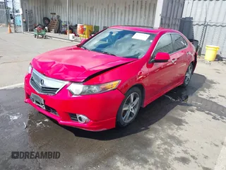 2014 Acura TSX Special Edition with VIN JH4CU2F86EC000910, listed as a IAAI auction lot 42223721 with 104,702 mi miles and . Bid and sale history available at DreamBid. Image 2.