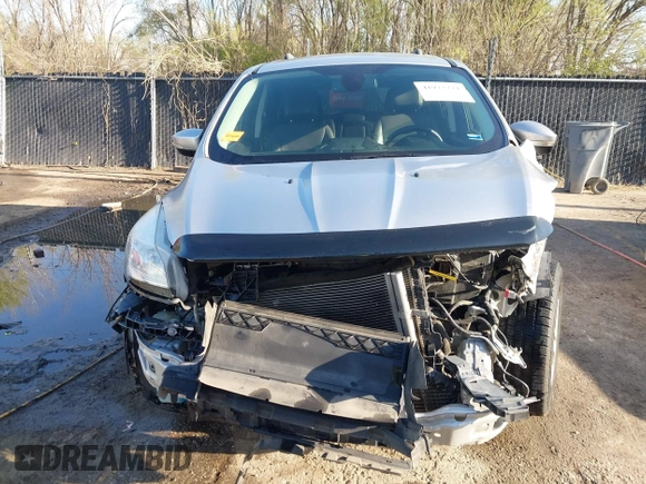 2013 Ford Escape SEL with VIN 1FMCU0HX4DUB98238, listed as a IAAI auction lot 41973221 with 131,590 mi miles and . Bid and sale history available at DreamBid. Image 13.