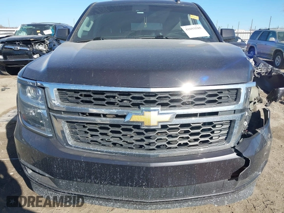 2016 Chevrolet Suburban LS with VIN 1GNSKGKC5GR411894, listed as a IAAI auction lot 41693585 with 144,449 mi miles. Bid and sale history available at carsss.com. Image 13.