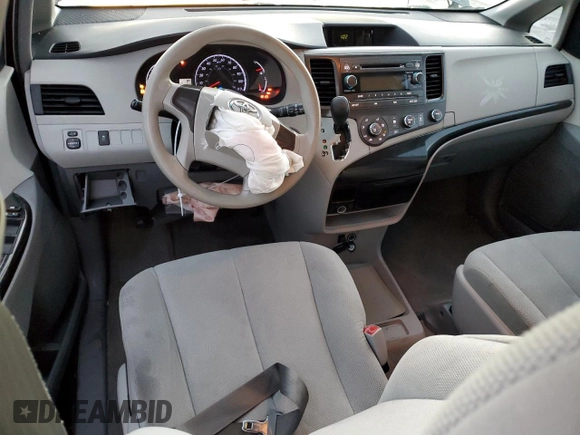 2014 Toyota Sienna L with VIN 5TDZK3DC1ES486586, listed as a Copart auction lot 84680574 with 122,332 mi miles and Salvage Title. Bid and sale history available at carsss.com. Image 8.
