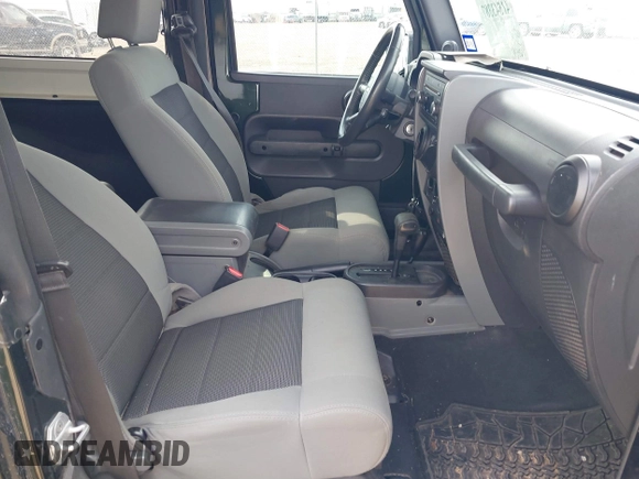 2010 Jeep Wrangler Mountain with VIN 1J4AA2D19AL193503, listed as a IAAI auction lot 41543387 with 63,490 mi miles and . Bid and sale history available at DreamBid. Image 5.