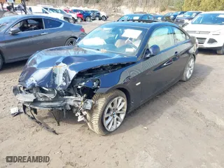 2009 BMW 3 Series 335i xDrive with VIN WBAWC73599E063418, listed as a IAAI auction lot 41781056 with 1 mi miles. Bid and sale history available at carsss.com. Image 2.