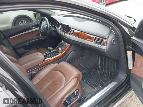 2012 Audi A8 с VIN WAUAVAFD0CN035731, выставлен на аукционе IAAI как лот 41286022 с пробегом 82 835 миль миль и . История ставок и продаж доступна на DreamBid. Изображение 5.