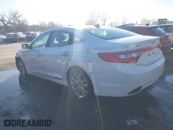 2014 Hyundai Azera with VIN KMHFG4JG6EA354949, listed as a IAAI auction lot 41034372 with 173,338 mi miles and . Bid and sale history available at DreamBid. Image 3.