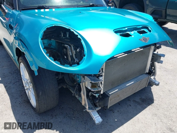 2017 MINI Convertible Cooper S z VIN WMWWG9C30H3C80917, wystawiony jako IAAI lot #42227320 z przebiegiem 38 490 mil mil oraz . Historia ofert i sprzedaży dostępna na DreamBid. Obrazek 19.