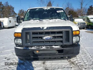 2014 Ford Econoline Cargo Commercial with VIN 1FTNS2EW9EDA62926, listed as a Copart auction lot 44061685 with 119,081 mi miles and Clean Title. Bid and sale history available at carsss.com. Image 5.