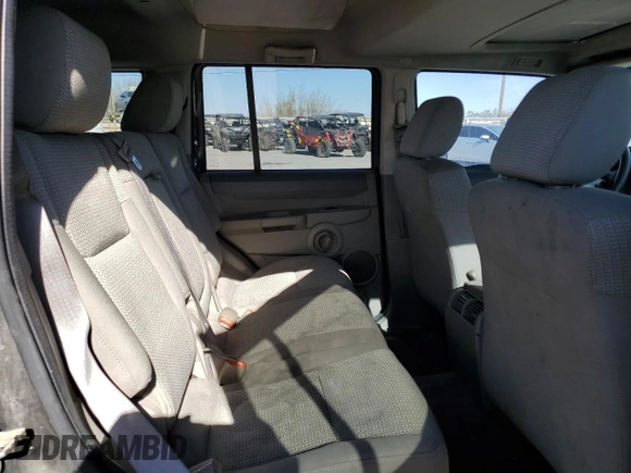 2006 Jeep Commander with VIN 1J8HH48K26C263986, listed as a Copart auction lot 84712294 with 216,923 mi miles and Salvage title. Bid and sale history available at DreamBid. Image 11.