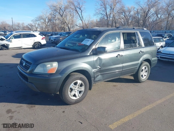 2005 Honda Pilot EX-L with NAVI with VIN 2HKYF18775H553666, listed as a IAAI auction lot 41858179 with 241,011 mi miles. Bid and sale history available at carsss.com. Image 2.