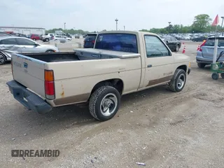 1986 Nissan Hardbody E with VIN JN6ND11S0GW000696, listed as a IAAI auction lot 42358321 with 445,199 mi miles and . Bid and sale history available at DreamBid. Image 4.