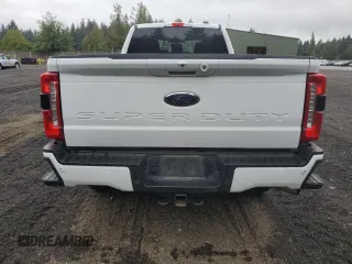 2023 Ford F-250 with VIN 1FT8X2BN0PEC27558, listed as a Copart auction lot 68699574 with 34,777 mi miles and Salvage title. Bid and sale history available at DreamBid. Image 6.