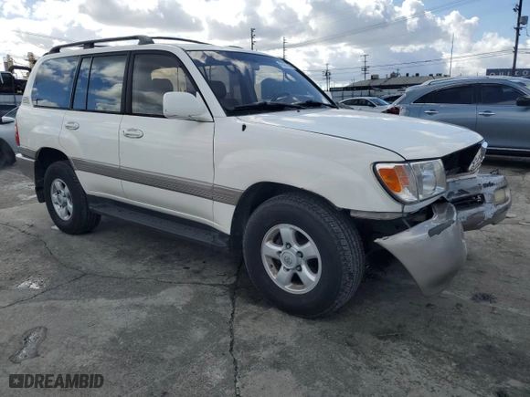 1999 Toyota Land Cruiser with VIN JT3HT05J7X0049786, listed as a Copart auction lot 45527005 with 199,447 mi miles and Salvage Title. Bid and sale history available at carsss.com. Image 4.