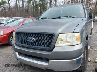 2005 Ford F-150 XLT with VIN 1FTPX12575NA22872, listed as a IAAI auction lot 41532157 with 261,093 mi miles. Bid and sale history available at carsss.com. Image 6.