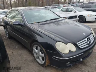 2005 Mercedes-Benz CLK-Class 3.2L with VIN WDBTJ65J15F153987, listed as a IAAI auction lot 41771112 with 208,754 mi miles. Bid and sale history available at carsss.com. Image 1.
