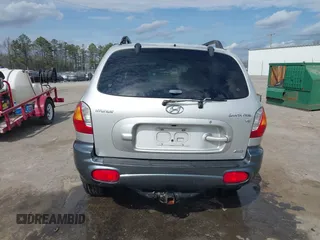 2002 Hyundai Santa Fe GLS with VIN KM8SC73D62U209998, listed as a IAAI auction lot 41915060 with 228,451 mi miles. Bid and sale history available at carsss.com. Image 16.