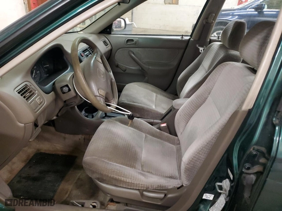 1999 Honda Civic VP with VIN 2HGEJ6611XH594868, listed as a Copart auction lot 45193835 with 180,914 mi miles and Salvage Title. Bid and sale history available at carsss.com. Image 7.