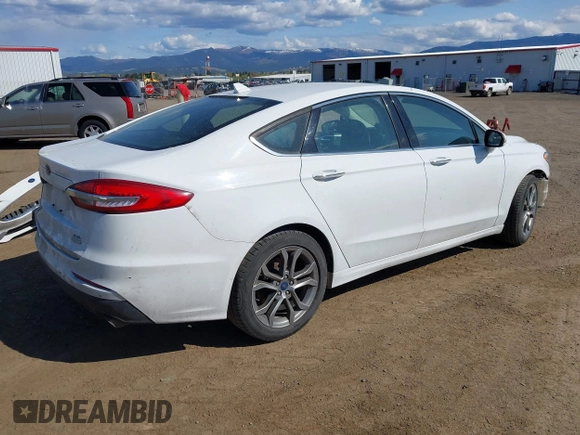 2019 Ford Fusion SEL with VIN 3FA6P0CD8KR117614, listed as a IAAI auction lot 42105025 with 135,801 mi miles and . Bid and sale history available at DreamBid. Image 4.