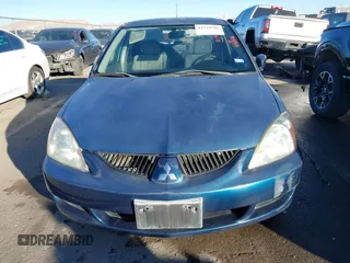 2005 Mitsubishi Lancer ES with VIN JA3AJ26E65U014838, listed as a IAAI auction lot 41310586 with 127,487 mi miles. Bid and sale history available at carsss.com. Image 12.