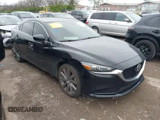 2021 Mazda Mazda6 Touring with VIN JM1GL1VM0M1617714, listed as a IAAI auction lot 41919559 with 60,129 mi miles. Bid and sale history available at carsss.com. Image 1.