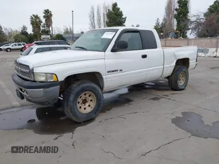 2001 Dodge 1500 with VIN 3B7HF13Z01M555854, listed as a IAAI auction lot 41555752 with 164,111 mi miles and . Bid and sale history available at DreamBid. Image 2.