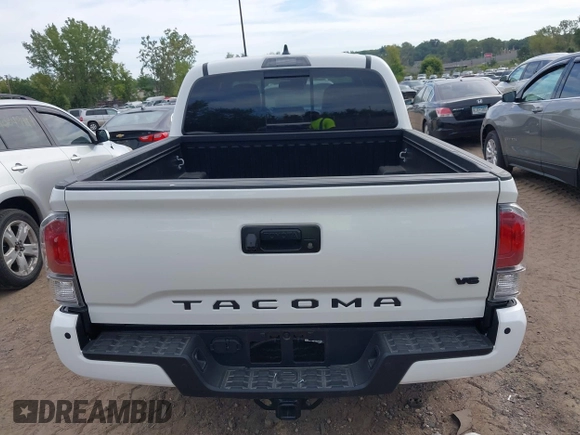 2023 Toyota Tacoma SR z VIN 3TMCZ5AN1PM637609, wystawiony jako IAAI lot #40345917 z przebiegiem 12 614 mil mil oraz . Historia ofert i sprzedaży dostępna na DreamBid. Obrazek 16.
