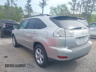 2007 Lexus RX 350 with VIN 2T2GK31U07C023916, listed as a IAAI auction lot 42026162 with 168,099 mi miles. Bid and sale history available at carsss.com. Image 3.