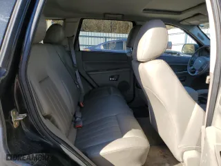 2005 Jeep Grand Cherokee Laredo with VIN 1J4HS48N05C566325, listed as a Copart auction lot 84743394 with 160,840 mi miles and Salvage Title. Bid and sale history available at carsss.com. Image 11.