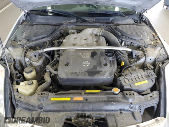 2003 Nissan 350Z Touring с VIN JN1AZ34D03T114076, выставлен на аукционе Copart как лот 61078255 с пробегом 187 952 миль миль и Списание • Salvage title. История ставок и продаж доступна на DreamBid. Изображение 11.