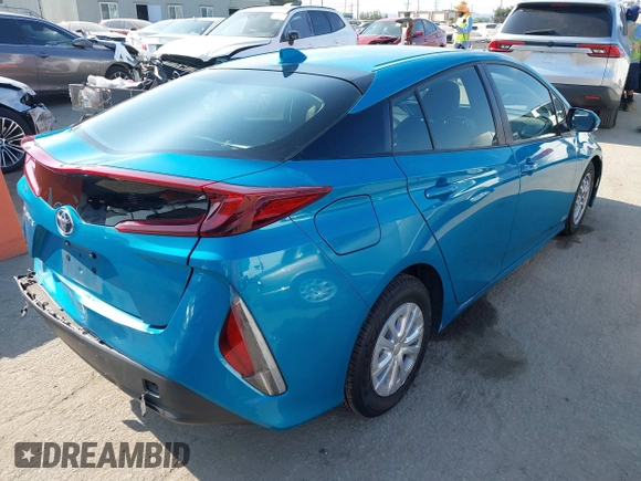 2022 Toyota Prius LE with VIN JTDKAMFP8N3209977, listed as a IAAI auction lot 42777763 with 52,995 mi miles and . Bid and sale history available at DreamBid. Image 4.