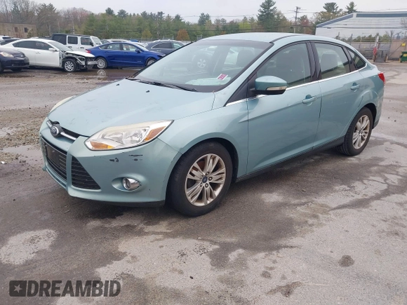 2012 Ford Focus SEL with VIN 1FAHP3H29CL430964, listed as a IAAI auction lot 42186057 with 122,279 mi miles. Bid and sale history available at carsss.com. Image 2.
