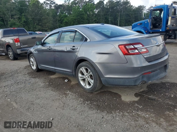 2014 Ford Taurus SEL with VIN 1FAHP2E84EG123006, listed as a Copart auction lot 53367795 with 216,092 mi miles and Salvage Title. Bid and sale history available at carsss.com. Image 2.