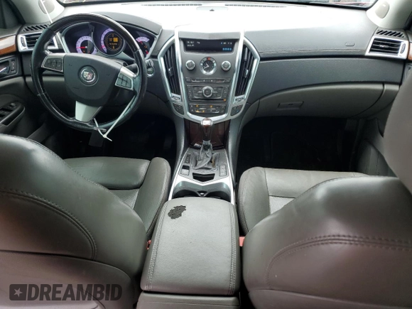 2012 Cadillac SRX Performance Collection with VIN 3GYFNBE39CS655341, listed as a Copart auction lot 62350625 with 156,043 mi miles and Salvage title. Bid and sale history available at DreamBid. Image 8.