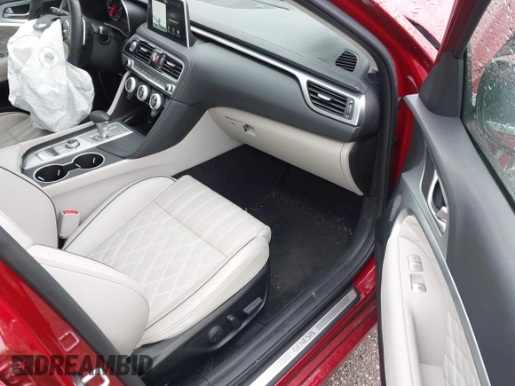 2021 Genesis G70 2.0T with VIN KMTG44LA0MU075456, listed as a IAAI auction lot 42212601 with 19,503 mi miles and . Bid and sale history available at DreamBid. Image 5.