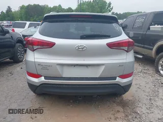 2017 Hyundai Tucson SE with VIN KM8J3CA44HU585714, listed as a IAAI auction lot 42097980 with 96,483 mi miles. Bid and sale history available at carsss.com. Image 16.