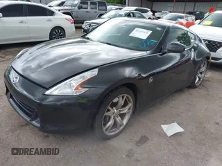 2011 Nissan 370Z Touring with VIN JN1AZ4EH3BM550677, listed as a IAAI auction lot 42217431 with 182,904 mi miles and . Bid and sale history available at DreamBid. Image 2.