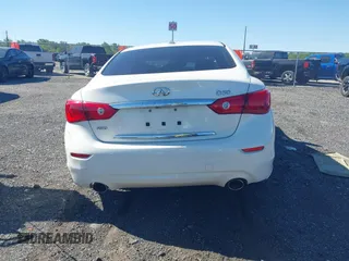 2015 Infiniti Q50 z VIN JN1BV7AR9FM413538, wystawiony jako IAAI lot #42115540 z przebiegiem 116 620 mil mil oraz . Historia ofert i sprzedaży dostępna na DreamBid. Obrazek 16.