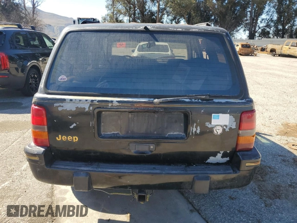 1993 Jeep Grand Cherokee Limited with VIN 1J4GZ78S3PC502345, listed as a Copart auction lot 46933805 with 121,652 mi miles and Salvage title. Bid and sale history available at DreamBid. Image 6.