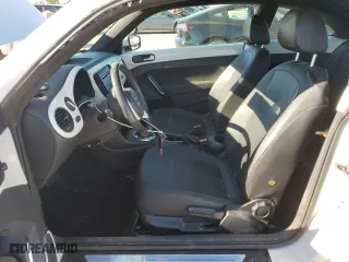 2012 Volkswagen Beetle 2.5L with VIN 3VWJX7AT0CM659261, listed as a Copart auction lot 79513824 with 144,537 mi miles and Salvage Title. Bid and sale history available at carsss.com. Image 7.