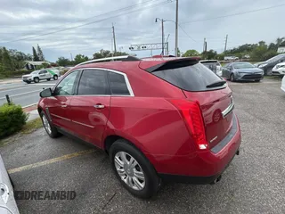 2015 Cadillac SRX Luxury Collection z VIN 3GYFNBE37FS569840, wystawiony jako Copart lot #56965835 z przebiegiem 183 817 mil mil oraz Tytuł czysty. Historia ofert i sprzedaży dostępna na DreamBid. Obrazek 3.