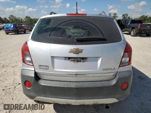 2014 Chevrolet Captiva Sport LS with VIN 3GNAL2EK8ES657346, listed as a Copart auction lot 77226774 with 164,497 mi miles and Salvage Title. Bid and sale history available at DreamBid. Image 6.