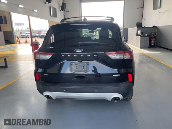 2020 Ford Escape SEL with VIN 1FMCU9H69LUA59992, listed as a IAAI auction lot 42843751 with 87,913 mi miles and . Bid and sale history available at DreamBid. Image 4.