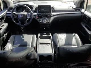 2021 Honda Odyssey Touring with VIN 5FNRL6H85MB008260, listed as a Copart auction lot 49244845 with 58,570 mi miles and Salvage Title. Bid and sale history available at carsss.com. Image 8.