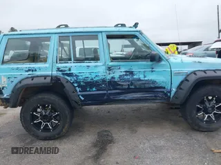1997 Jeep Cherokee SE z VIN 1J4FJ28S3VL573144, wystawiony jako IAAI lot #41965201 z przebiegiem 298 276 mil mil oraz . Historia ofert i sprzedaży dostępna na DreamBid. Obrazek 13.
