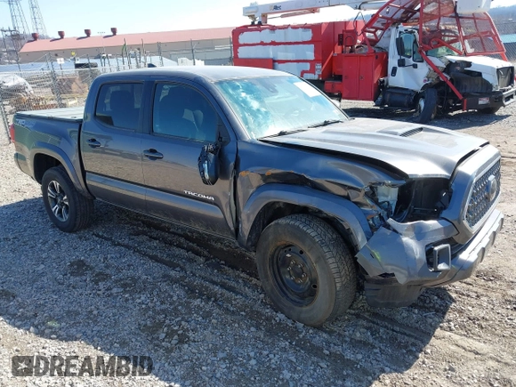 2018 Toyota Tacoma SR with VIN 5TFCZ5AN9JX123749, listed as a IAAI auction lot 41768884 with 42,852 mi miles and . Bid and sale history available at DreamBid. Image 1.